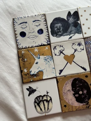 Set of 11 ceramic tiles “Fairy Tables’ images Compendium”